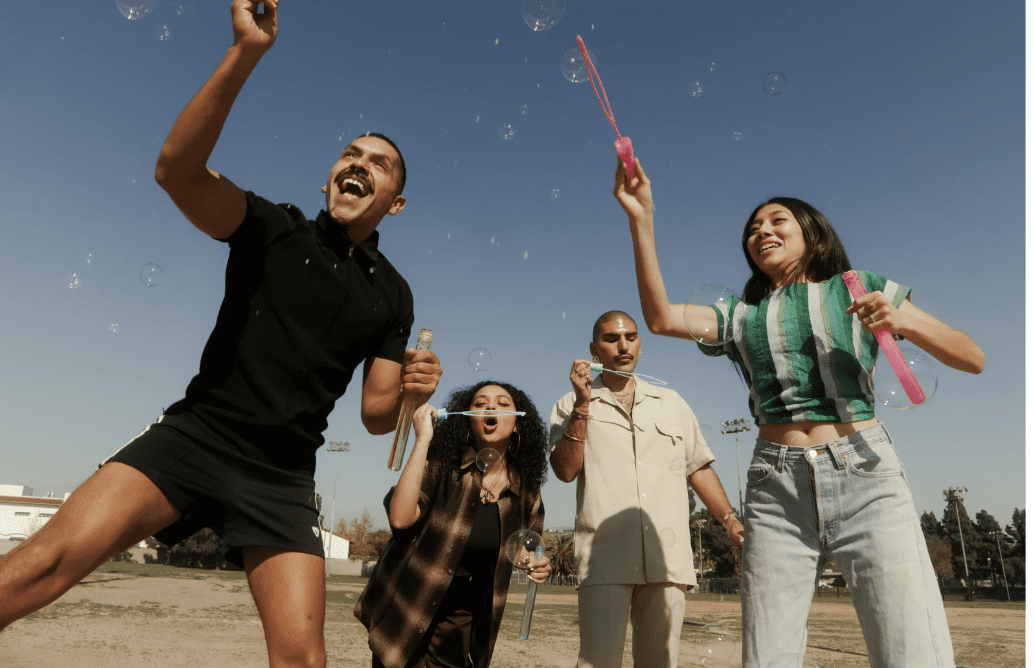 fun Adults having fun with bubbles.